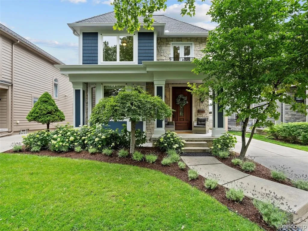 Charming craftsman home with blue shutters — Metro Detroit seller