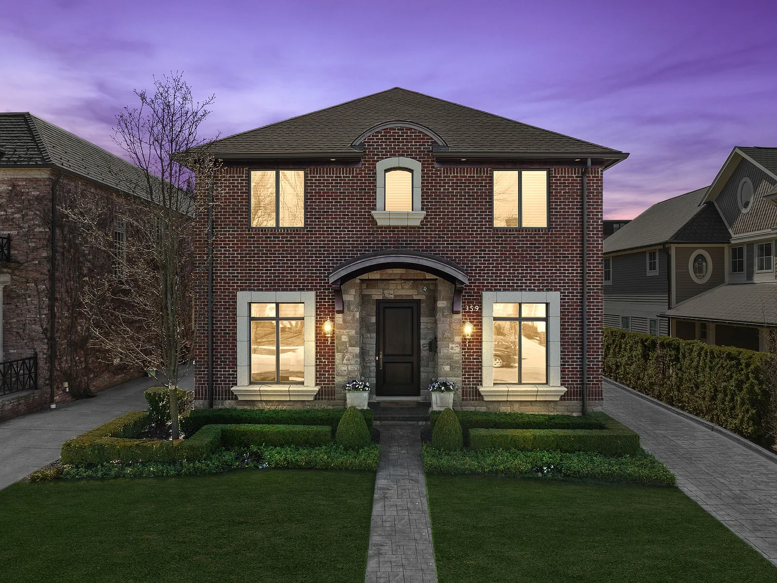 Brick colonial home at twilight ready to list — Metro Detroit